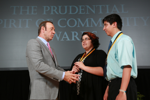 Two of New Mexico's Youth Volunteers are honored with a warm, sweaty handshake from Kevin Spacey.
