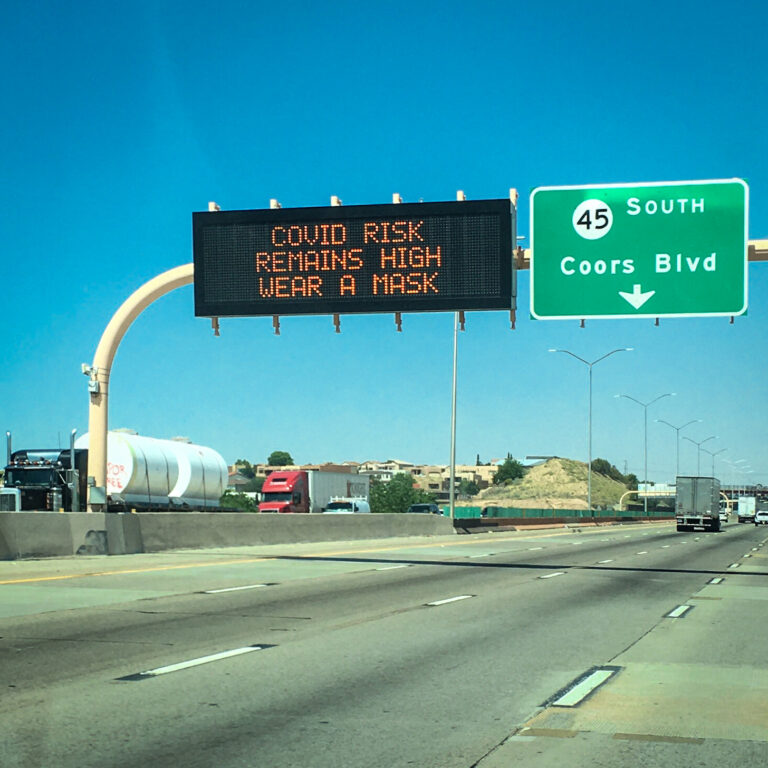 COVID-19 warning sign over I-24